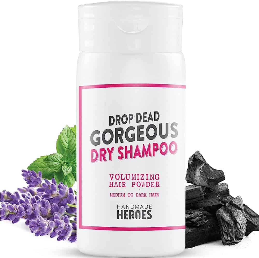 A bottle of Handmade Heroes dry shampoo powder.