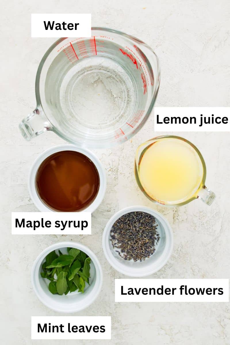 The ingredients needed to make lavender mint lemonade separated into bowls.