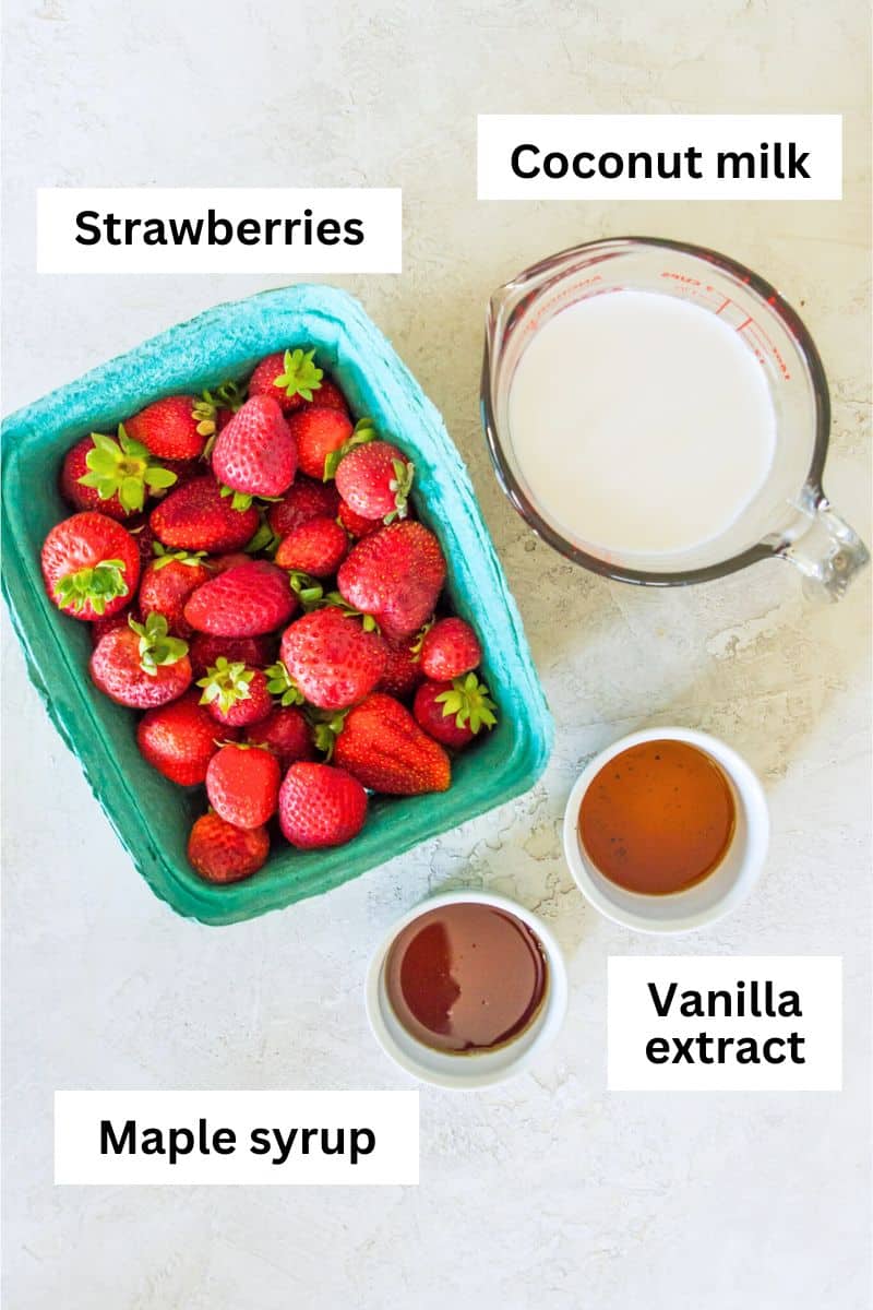 The ingredients needed to make strawberry vanilla popsicles separated into individual bowls. 