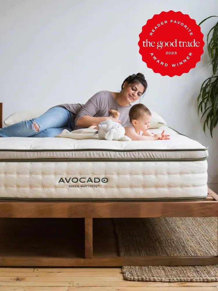 A women and a baby on an Avocado brand mattress. 
