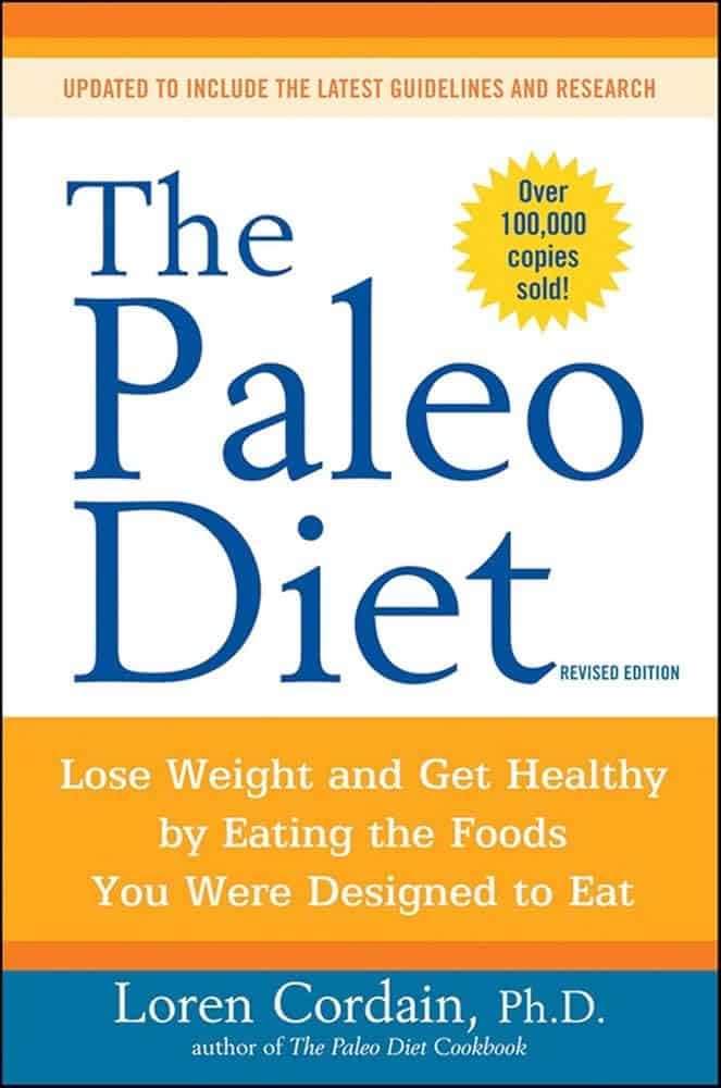 A book called "The Paleo Diet" which a white cover and orange and yellow banners at the top and bottom. 