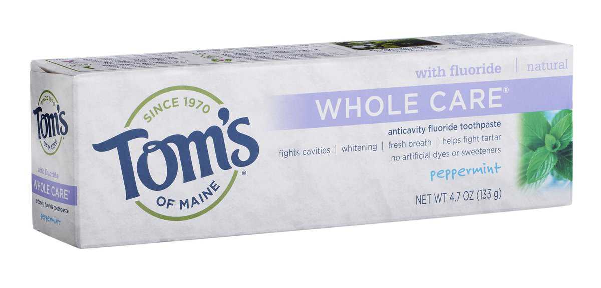 A tube of Tom's Whole Care toothpaste.