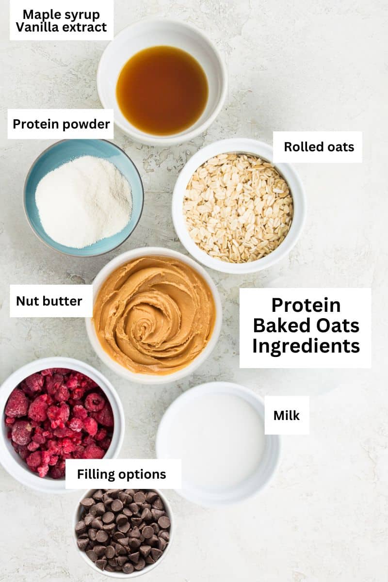 The ingredients needed to make protein baked oats separated into small bowls including rolled oats, nut butter, protein powder, milk, maple syrup and vanilla extract.